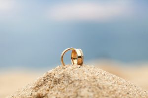 Couple ring on sand